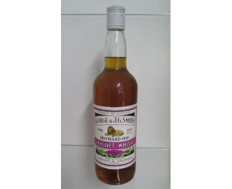 A 75cl 40% vol bottle of single Malt Scotch Whisky Glenlivet 1938 George &amp; J.G Smith, seal and level good 
