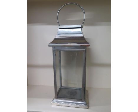 A large stainless steel lantern, 83cm tall x 30cm x 22cm 