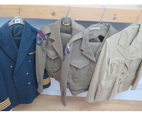 Two Royal Artillery battle dresses and trousers, a Khaki drill jacket and jacket and trousers 