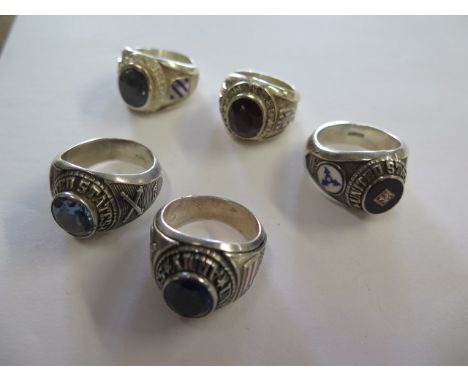 Five modern silver rings with military enamel insignia, total weight approx 95 grams 