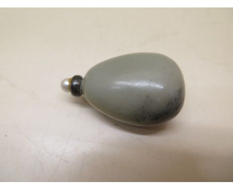 A 19th century Chinese jade snuff bottle with a silver and pearl replacement stopper, 6cm x 4cm&nbsp;&nbsp;small chips and cr