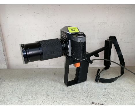 A PRAKTICA SLR Camera with 75 - 200mm lens and pistol grip and release, a selection of other cameras 