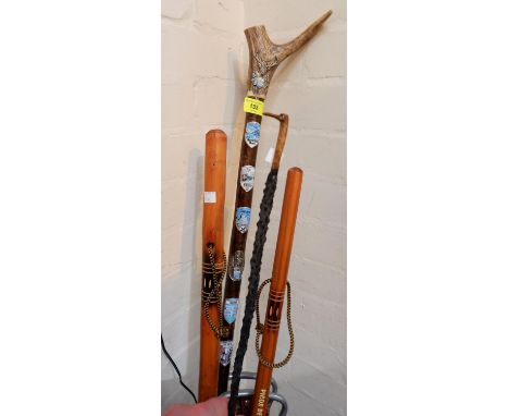 An Antler handle thumb stick; a shooting stick; 2 wooden Alpine trekking stick 