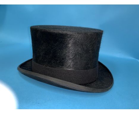 A Moss Bros top hat size 71/4'' 
