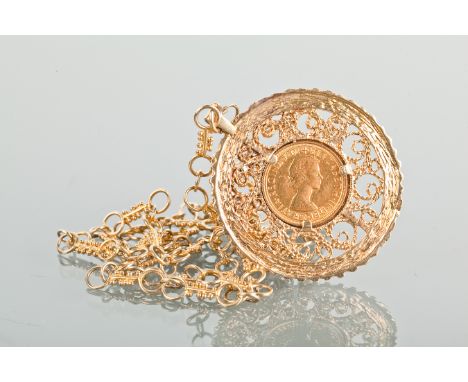 SOVEREIGN DATED 1967
in a large mount, on a chain, unmarked, 49g