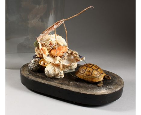 AN UNUSUAL SHELL WORK FIGURE GROUP WITH TORTOISE TAXIDERMY, housed under a glass dome. 18ins high.