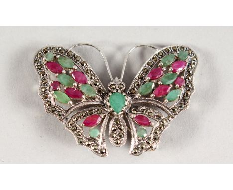 A SILVER, RUBY AND EMERALD BUTTERFLY BROOCH.