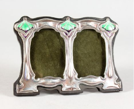 A SMALL SILVER AND ENAMEL DOUBLE PHOTOGRAPH FRAME. 3ins x 4ins.
