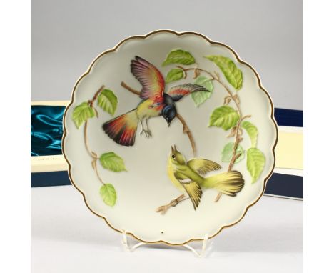 A SET OF TWELVE ROYAL WORCESTER PLATES "THE BIRDS OF DOROTHY DOUGHTY", Limited Edition, various dates 1970's-1983, boxed. 9in