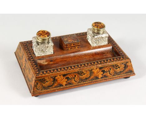 A GOOD TUNBRIDGE WARE MARQUETRY AND PARQUETRY TABLE INKSTAND, inlaid with scrolls and flowers, inset with two glass ink bottl