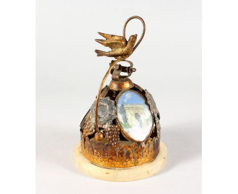 A PALAIS ROYALE GILT METAL TABLE BELL, with bird finial and pictorial panels. 5.5ins high.