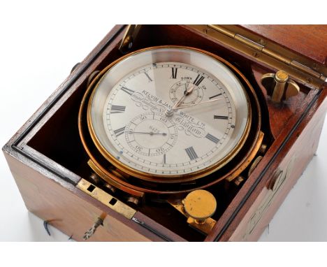 Kelvin & James White Ltd., Glasgow: a marine chronometer, no. 8473, in mahogany brass-bound case with concealed side carrying