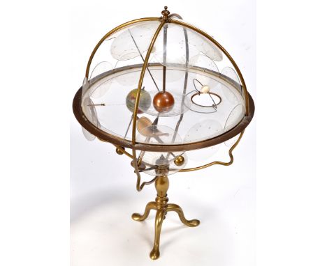 A first half 20th Century Orrery, the brass structure with plastic constellations and month dial, coloured globe standing on 