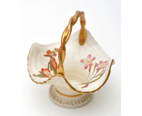 Royal Worcester basket, the interior painted with flowers, gilt twist handle, height 11cms, printed mark in lilac for 1890.
