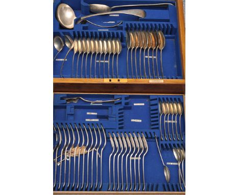 A late 19th Century part canteen of flatware, by Elkington & Co., Old English pattern and engraved initials, in oak canteen; 