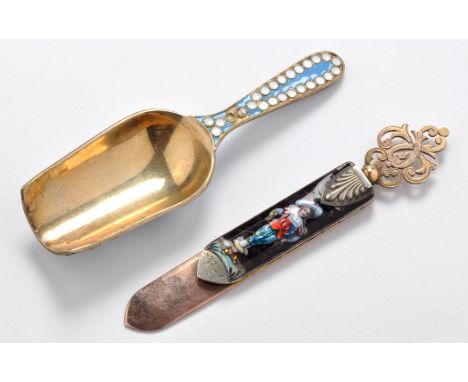 A French gilt and enamel page marker, decorated with a full-length figure of a man in period costume with shell above and ope
