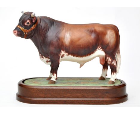 Royal Worcester figure of a Dairy Short Horn Bull, modelled by Doris Lindner, height 19.5cms, factory marks to base, numbered