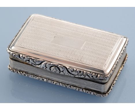 A George VI snuff box, by John Shaw, Birmingham 1820, engine turned rectangular form, with foliate rims and thumbpiece, 2 3/8