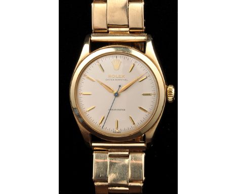 Rolex: a 9ct. gold chronometer wristwatch, Oyster Perpetual, ref. 6084, serial no. 918054, with circular baton dial, 9ct. gol