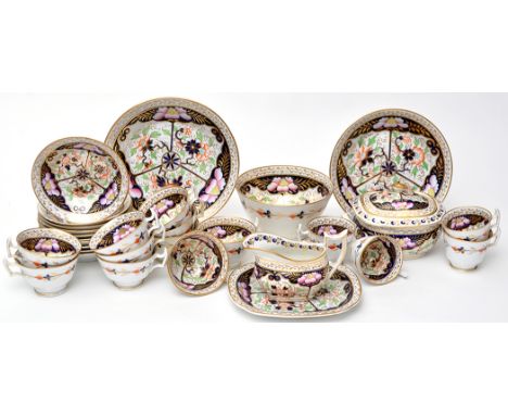 Derby style thirty-one piece part tea and coffee service, painted in the 'Imari' pallete with pink detailing, comprising: sug