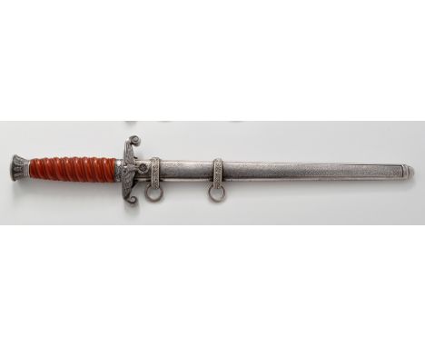 A WWII German Army officers dagger, by WKC, Solingen, the double edged blade on hilt with eagle pattern cross guard, orange p