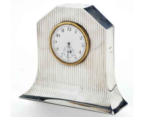 A George VI silver cased mantel clock, by J. Gloster, date marks rubbed but probably Birmingham 1946, enamelled arabic dial w