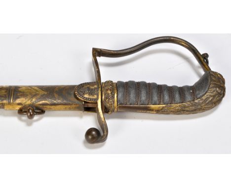 A 19th Century British midshipman's sword, the tapering blade on hilt with stirrup-guard, wire-bound shagreen grip and lion p