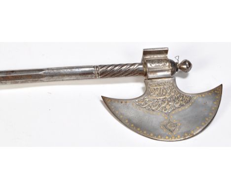 A 19th Century Persian steel hand axe, the half-moon shaped blade decorated in gilt with character marks, the handle with spi