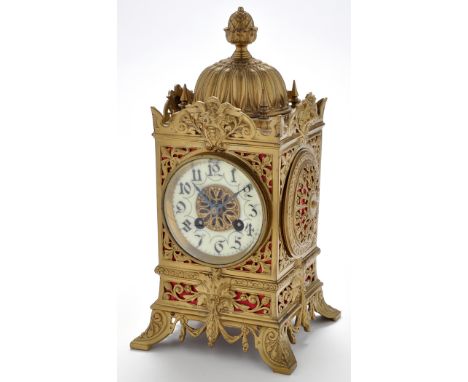 A late 19th Century French brass mantel clock, with Gothic style enamel dial, the 'Marti' twin train movement striking on a g
