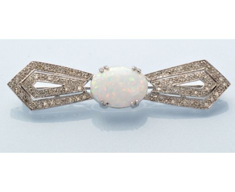 A synthetic opal and diamond bow pattern brooch, the oval synthetic opal in double claw mount set with eight-cut diamonds eit