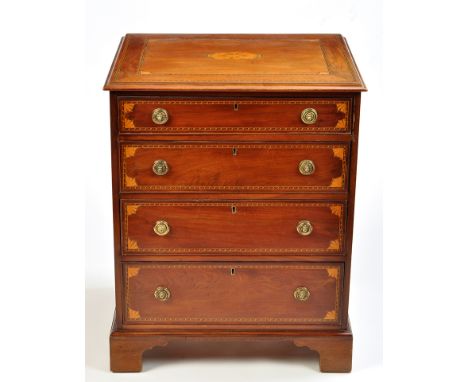 A 19th Century inlaid mahogany chest of four long graduated drawers, the top decorated with central paterae, corner fan motif