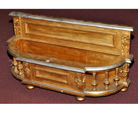 A 19th Century gilt and parcel silvered planter, the plain frieze flanked by acanthus leaf carvings above bowfront balustrade