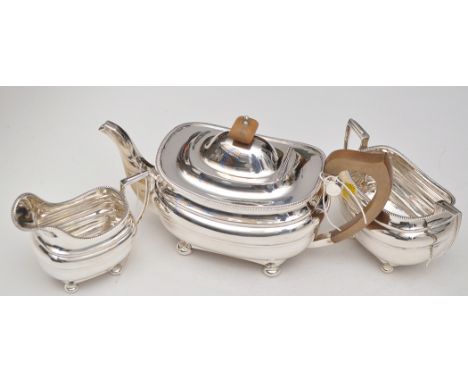 An Edward VIII three-piece tea service, by S. Blanckensee & Sons Ltd., Chester 1936, shaped rectangular form with gadrooned b