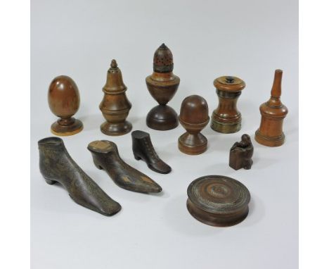 A small collection of 19th century treen, to include two muffineers, tallest 14cm, a yew darning egg, on stand, 10cm tall, an
