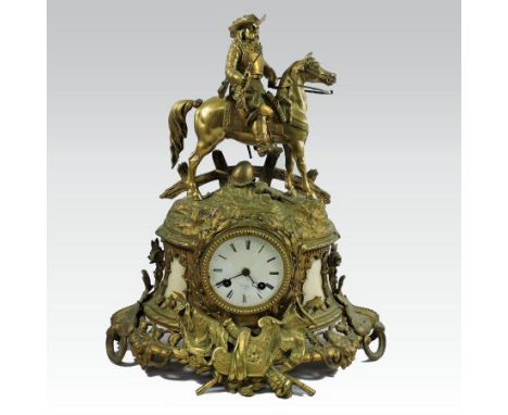 A 19th century French ormolu and white alabaster cased mantel clock, the scrolled cased with an inset white enamel dial signe