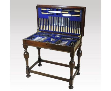 An early 20th century Sheffield plated Old English pattern canteen of cutlery, with twelve place settings, comprising over on