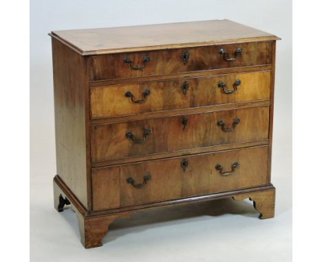 A George III mahogany chest, containing four long graduated drawers, on a bracket feet, 84cm