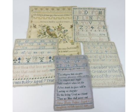 A group of five Victorian family samplers, each worked with the alphabet and verse, the first depicting a parrot on a branch,