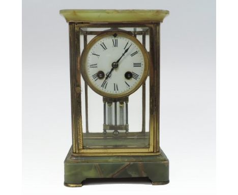 A 19th century French green onyx and brass cased four glass mantel clock, with a white enamel dial, the twin train movement, 