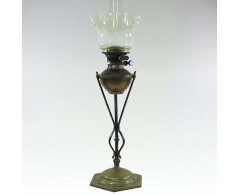 An Arts and Crafts brass oil lamp, by W.A.S. Benson, with an opaline frilled glass shade and Messengers patent copper reservo