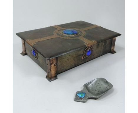 An Arts and Crafts copper casket, of Liberty style, of rectangular hinged shape, with a planished finish, together with a blu