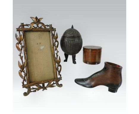 A 19th century Swiss carved wooden easel photograph frame, with a foliate surround, 26 x 16cm, together with a 19th century y
