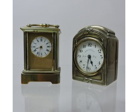 A 19th century brass cased miniature carriage clock, with a white enamel dial and lever platform escapement, 7cm tall, togeth