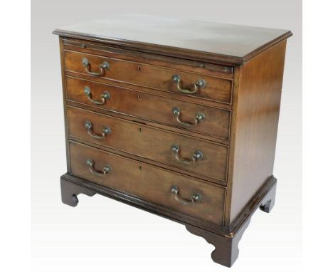A George III mahogany bachelor's chest, fitted with a brushing slide, over four long graduated drawers, on bracket feet, 100c
