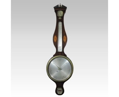 A 19th century mahogany and chevron strung cased wheel barometer, having a ten inch silvered dial, the trunk inlaid with pate