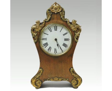 An early 20th century French walnut and gilt brass mounted mantel clock, 25cm tall 