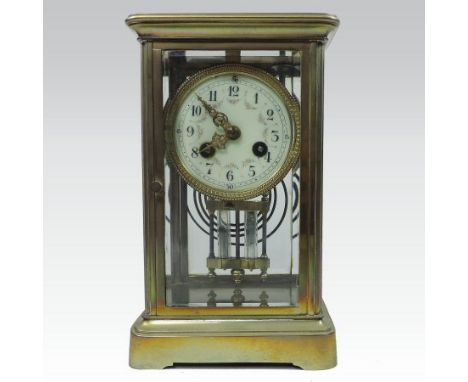 A 19th century brass cased four glass mantel clock, the white enamel dial painted with festoons of coloured flowers having a 