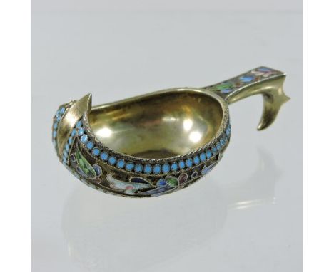 A Russian silver gilt and enamelled Kovsh, of typical shape, decorated with a frieze of flowers, impressed marks to base, 8cm