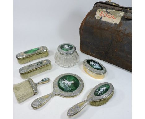 A late 19th century American leather vanity case, by Gorham, fitted with silver gilt, engine turned and enamelled dressing ta