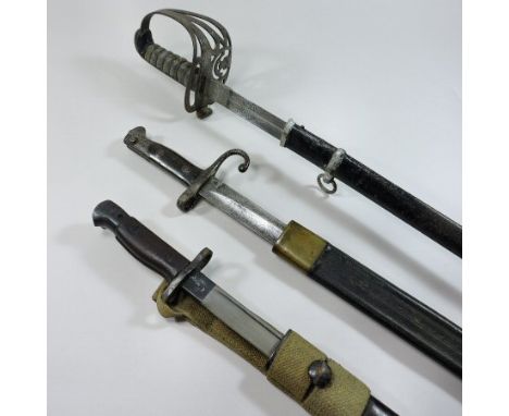 A 19th century British India Officers Cavalry Sword, having a bound fishskin handle and etched steel blade, inscribed Harman 